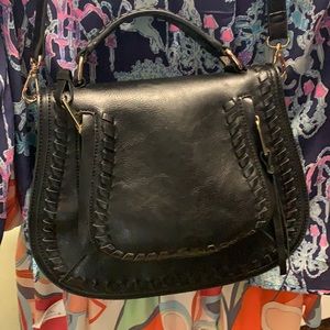 Black purse resembling Chloe Marci